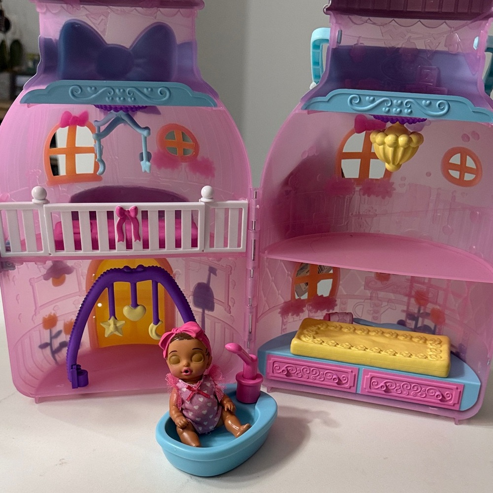 Pink and Blue Toy House with Yellow Accents